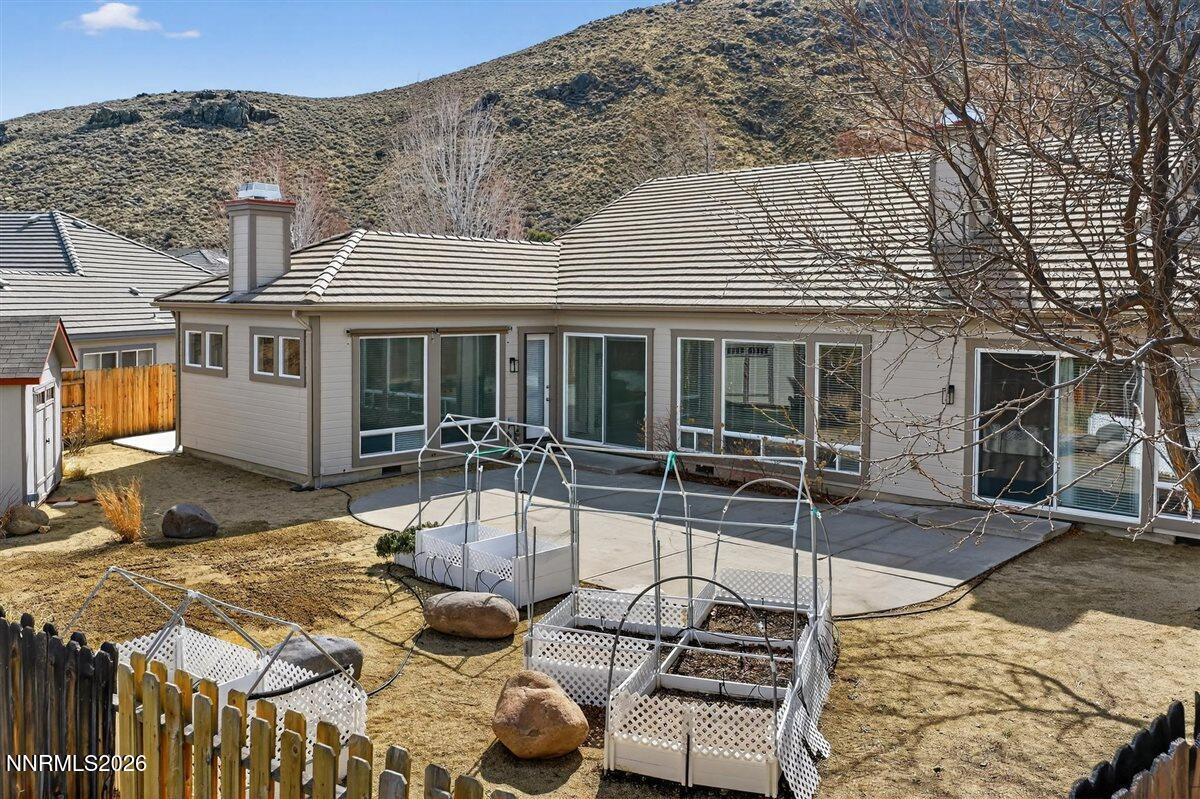 2214 St George Way Carson City, NV 89703 - Photo 47 of 57 front view of a house with a chairs