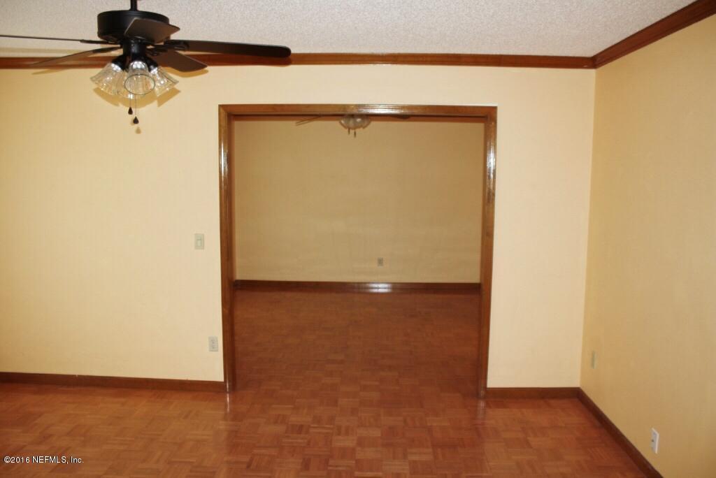 11529 Baskerville Road Jacksonville, FL 32223 - Photo 4 of 29 Dining Room to Living Room