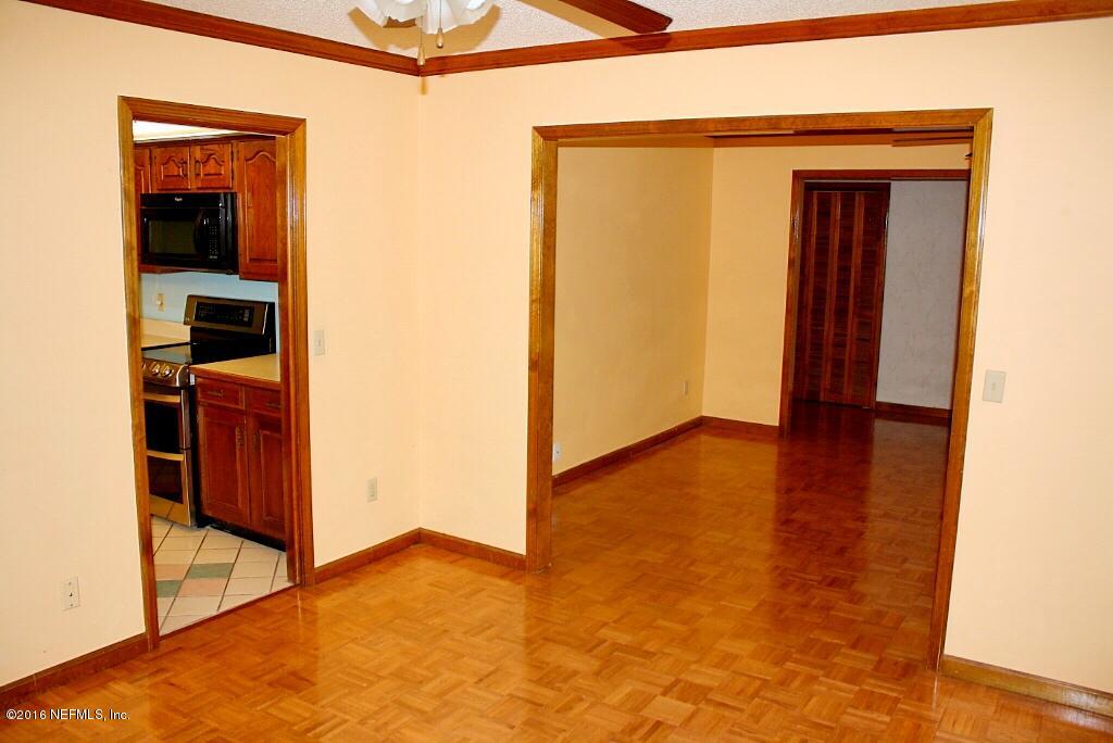 11529 Baskerville Road Jacksonville, FL 32223 - Photo 5 of 29 Living Room to Dining Room