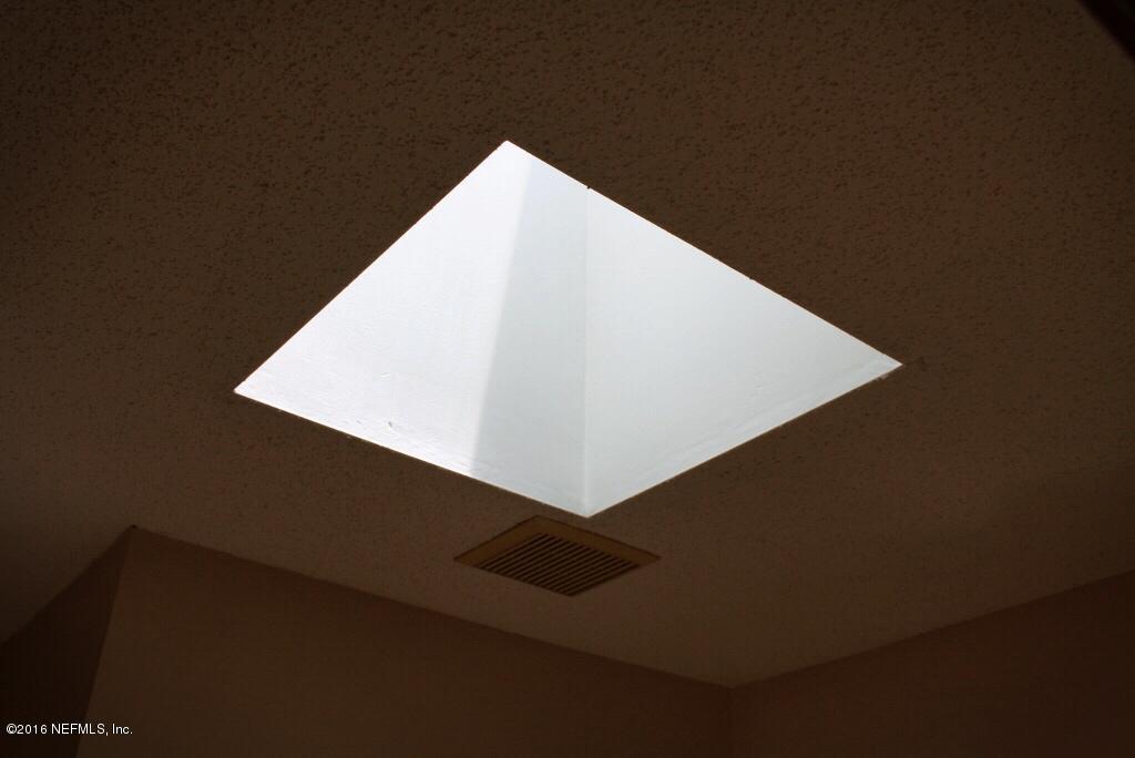 11529 Baskerville Road Jacksonville, FL 32223 - Photo 10 of 29 Skylight in Half Bathroom
