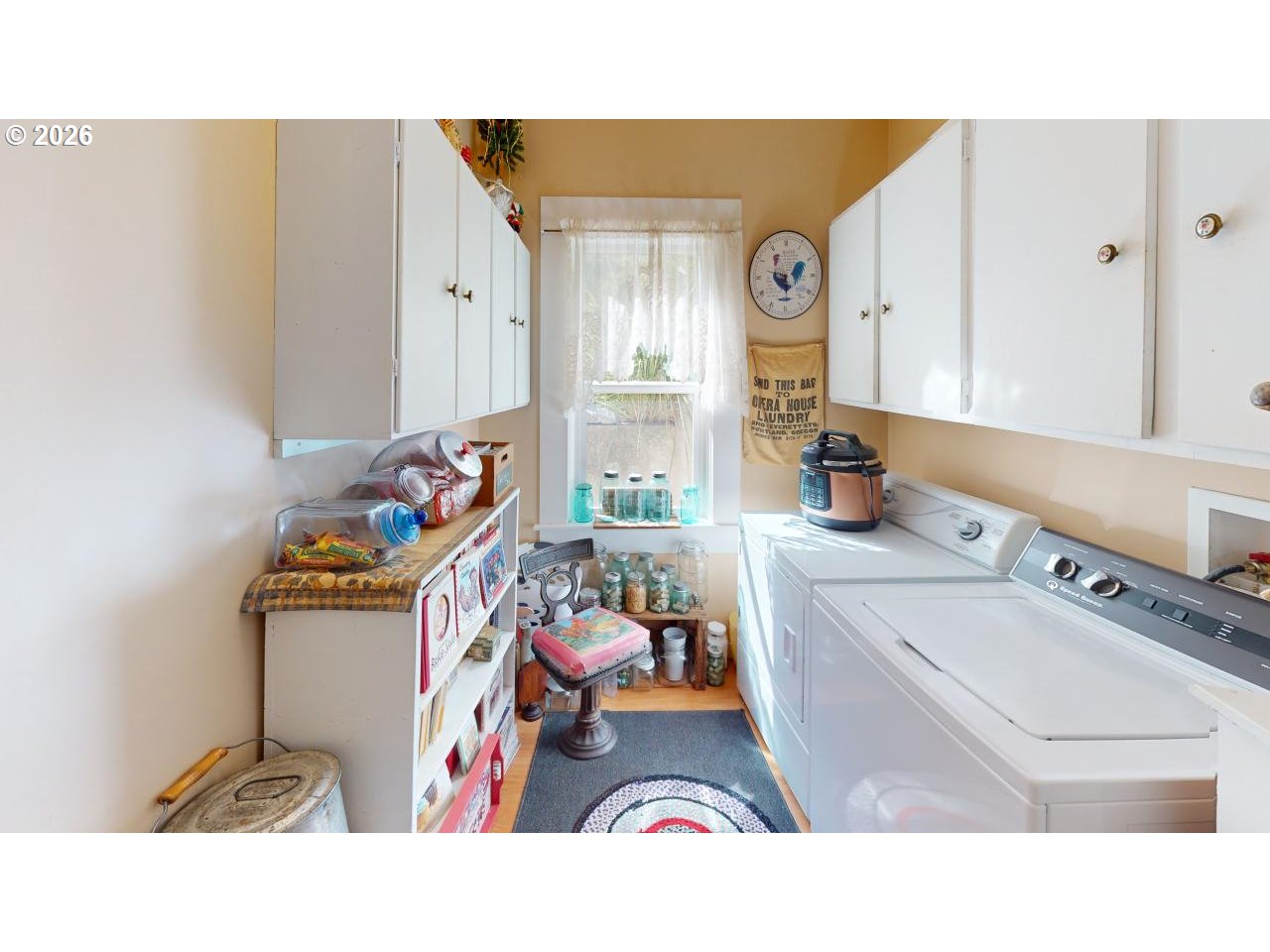 94361 Wedderburn Loop Gold Beach, OR 97444 - Photo 13 of 35 a utility room with dryer and washer