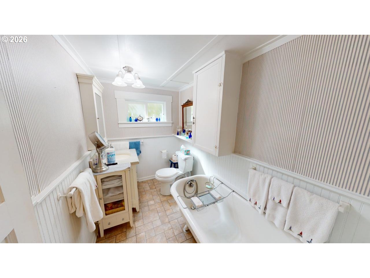 94361 Wedderburn Loop Gold Beach, OR 97444 - Photo 15 of 35 a living room with furniture and a table
