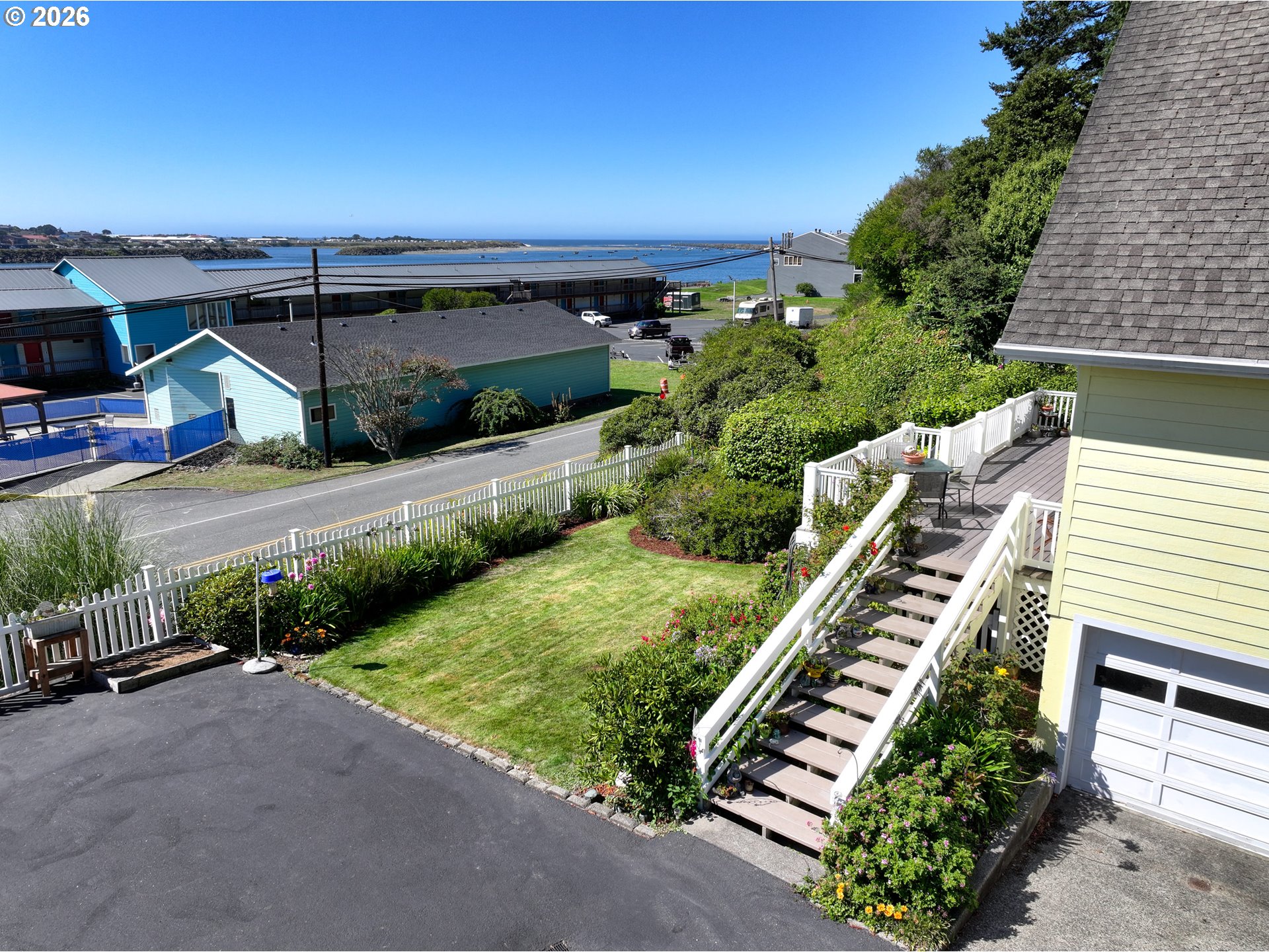 94361 Wedderburn Loop Gold Beach, OR 97444 - Photo 25 of 35 an aerial view of a house with a garden