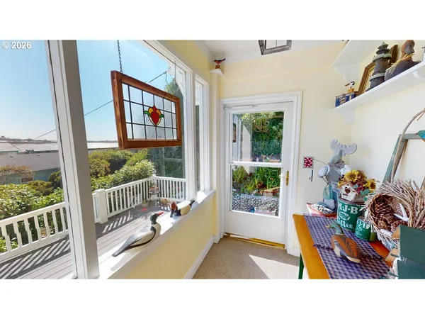 a black and white photo of a living room