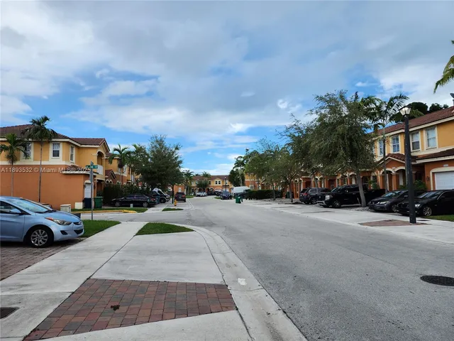 a cars parked on the side of a street