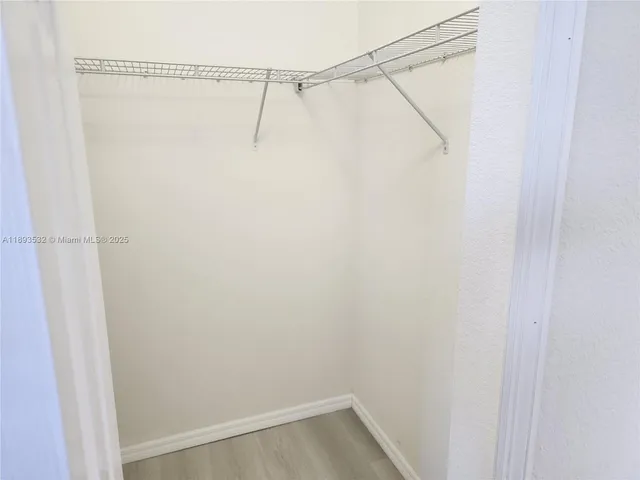 a view of a room with racks on the wall