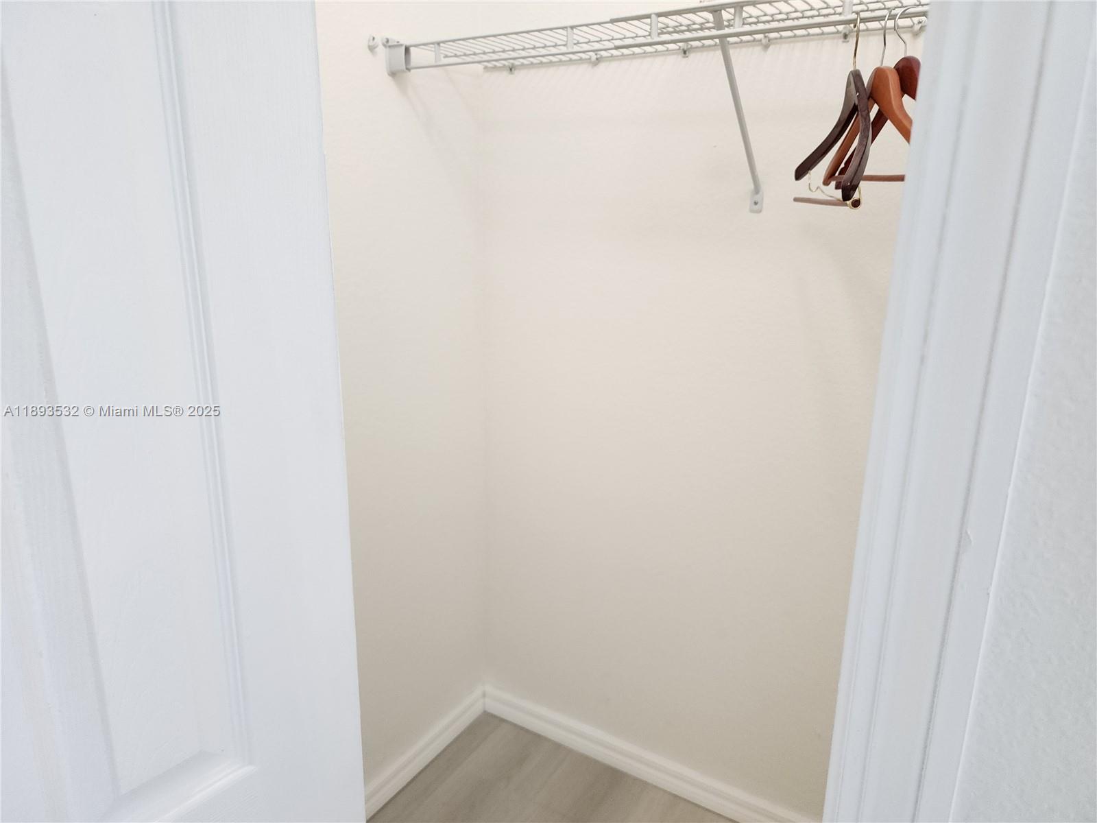 10831 Southwest 240th Lane Homestead, FL 33032 - Photo 27 of 33 a view of a room with racks on the wall