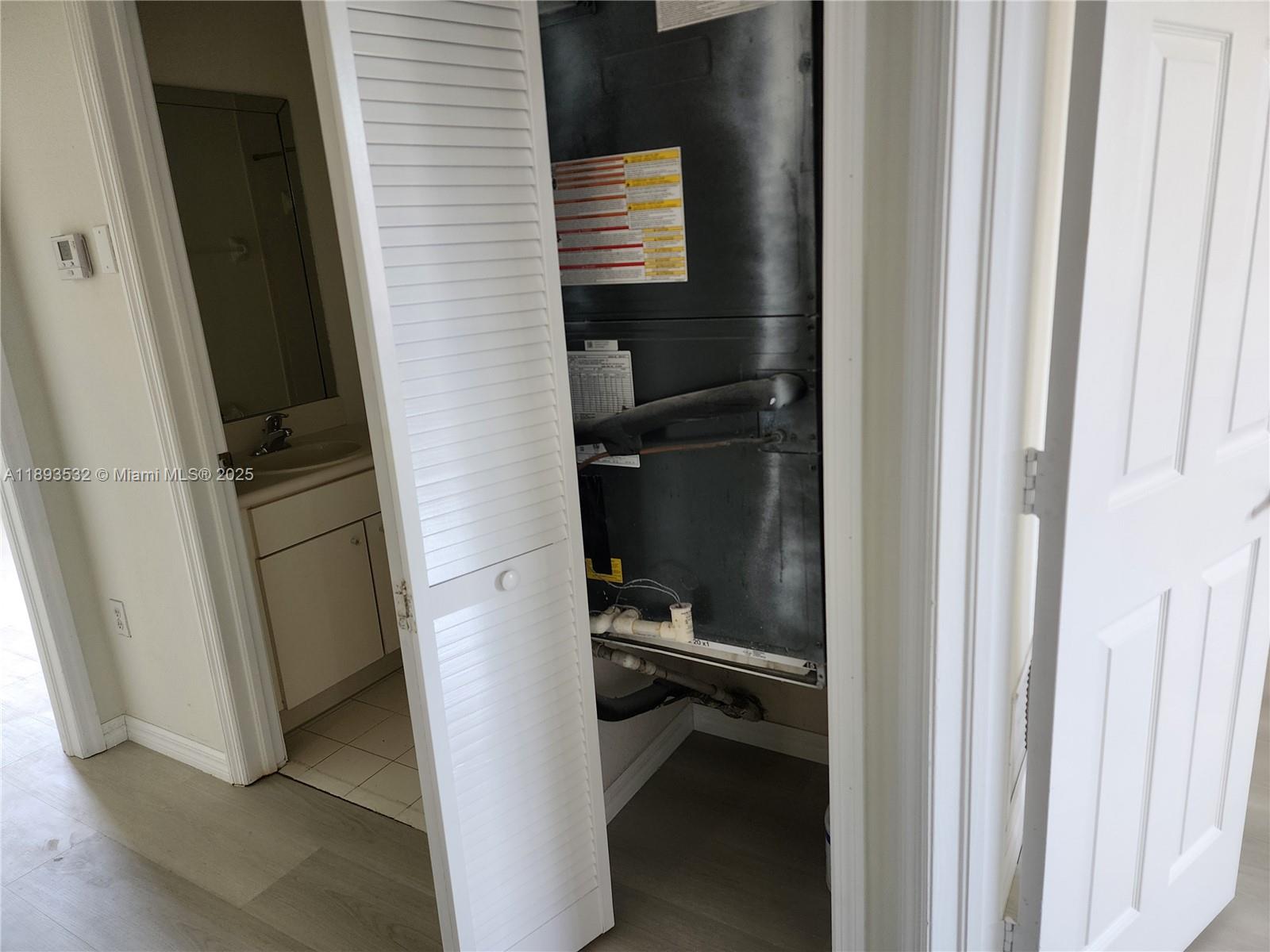 10831 Southwest 240th Lane Homestead, FL 33032 - Photo 30 of 33 a close view of walk in closet