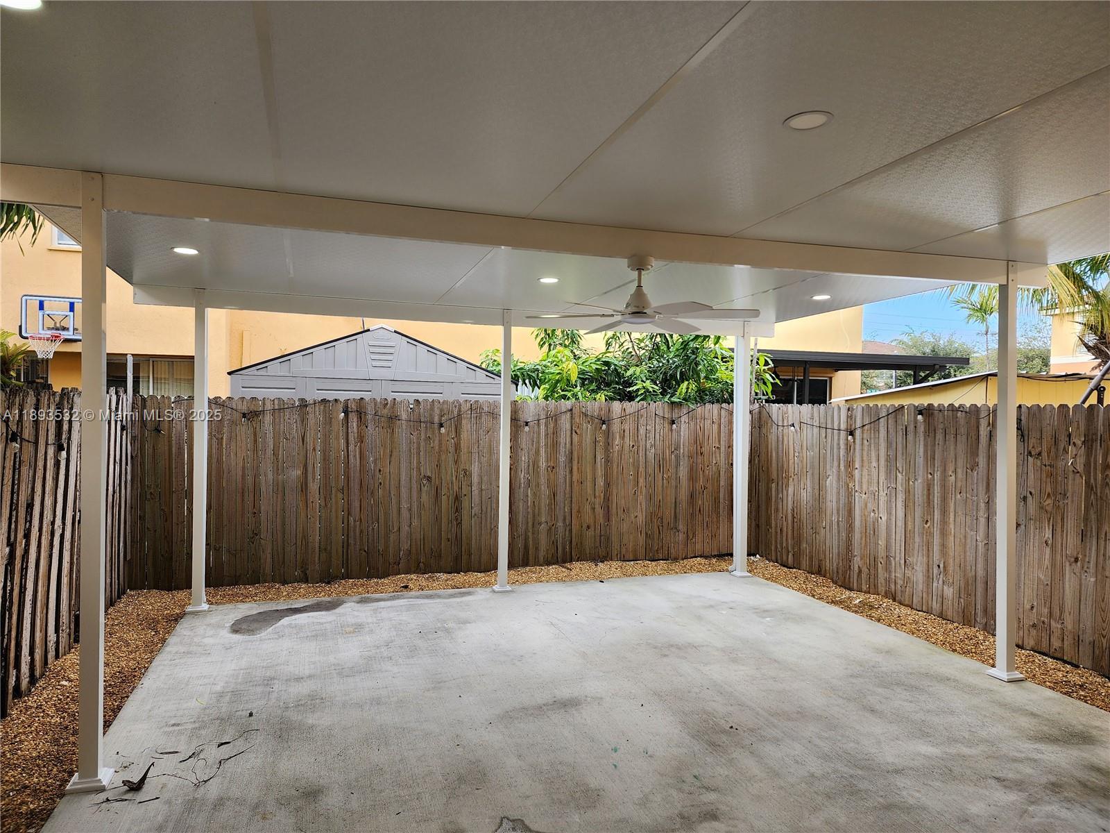 10831 Southwest 240th Lane Homestead, FL 33032 - Photo 8 of 33 a view of a backyard