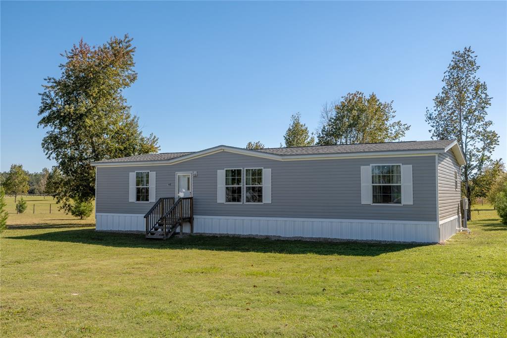a house view with a garden space