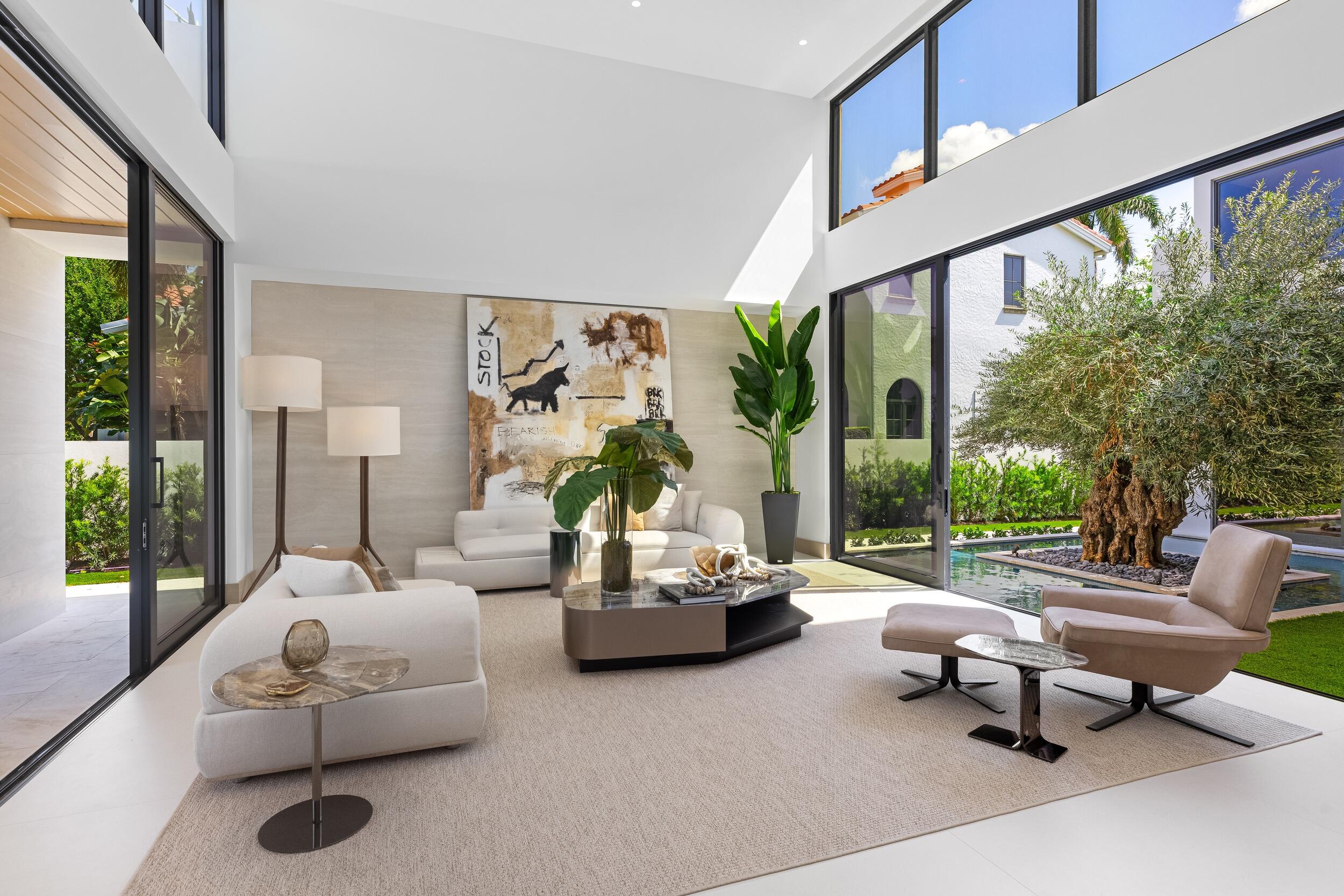 1351 Cocoanut Road Boca Raton, FL 33432 - Photo 16 of 101 a living room with furniture and a large window