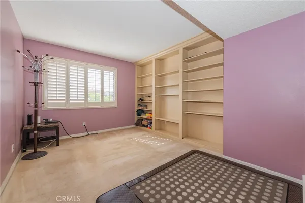 a room with furniture and window