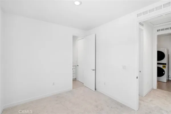 a view of a room with a hallway