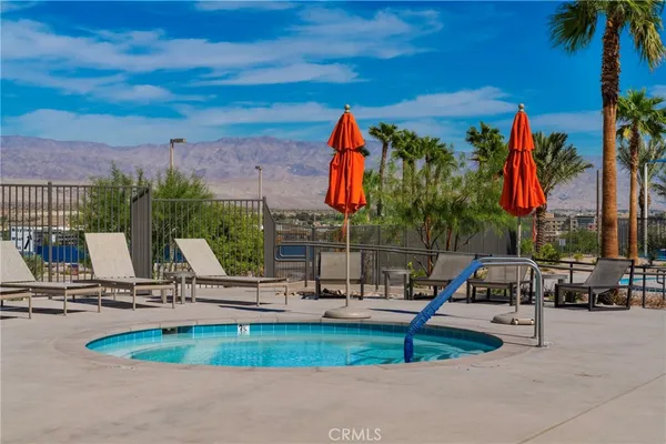 a view of a park with swings and slides