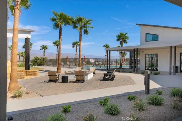 an outdoor view of house with outdoor seating