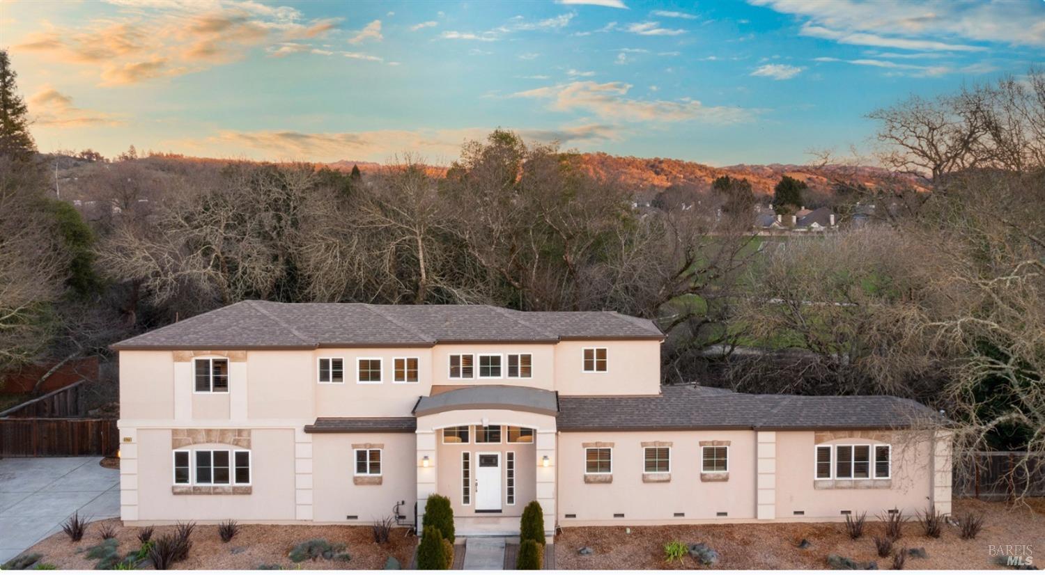 5 bed 4 bath house. - 3 bedrooms and 2 baths up, and 2 beds and 2 baths downstairs. Ensuite on each floor.