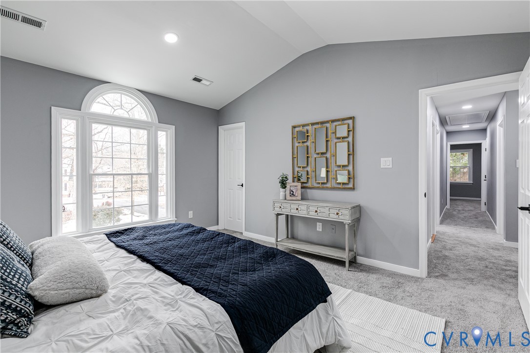7112 Harbourside Court Midlothian, VA 23112 - Photo 29 of 49 a bedroom with a bed and a window