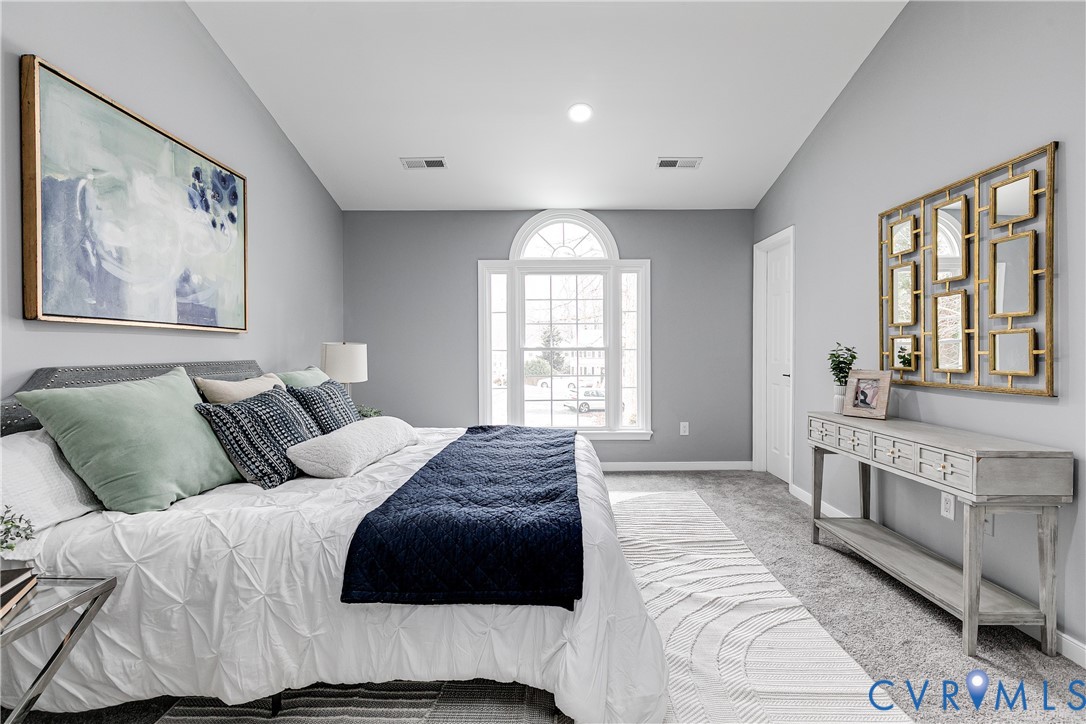 7112 Harbourside Court Midlothian, VA 23112 - Photo 35 of 49 a bedroom with a large bed and a window