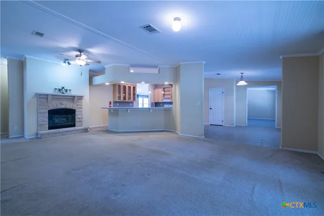 a view of a livingroom with a fireplace