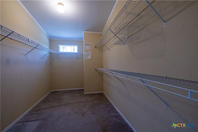 a view of a room with racks on the wall