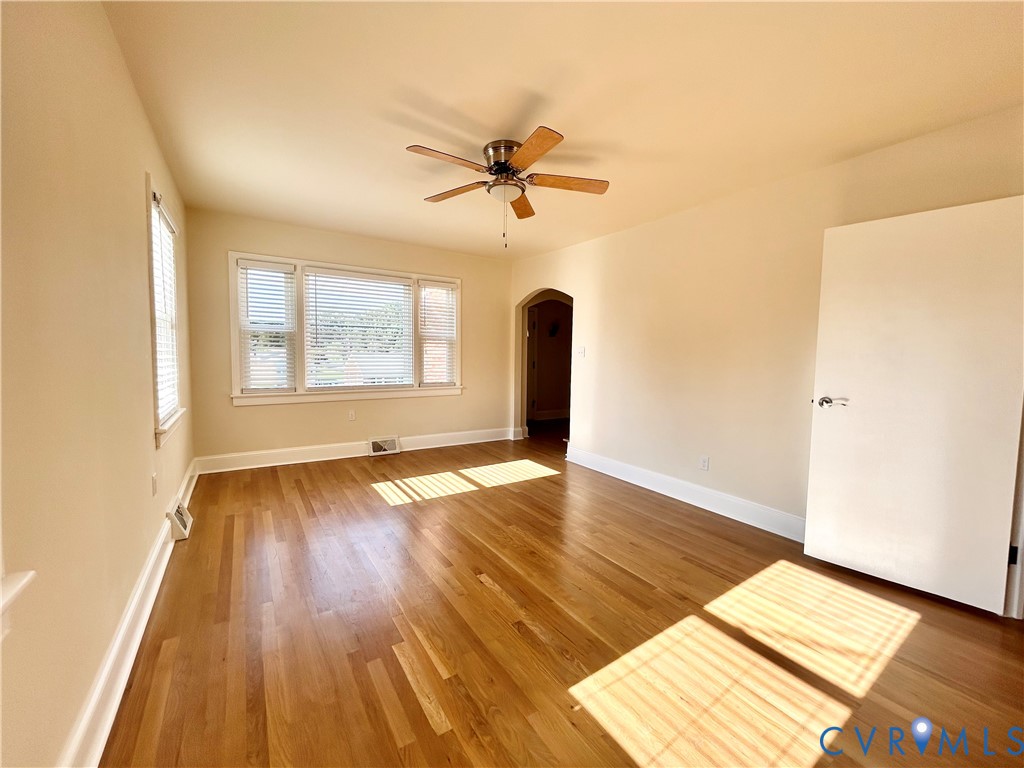 411 Hillcrest Avenue Colonial Heights, VA 23834 - Photo 18 of 33 wooden floor in an empty room with a window