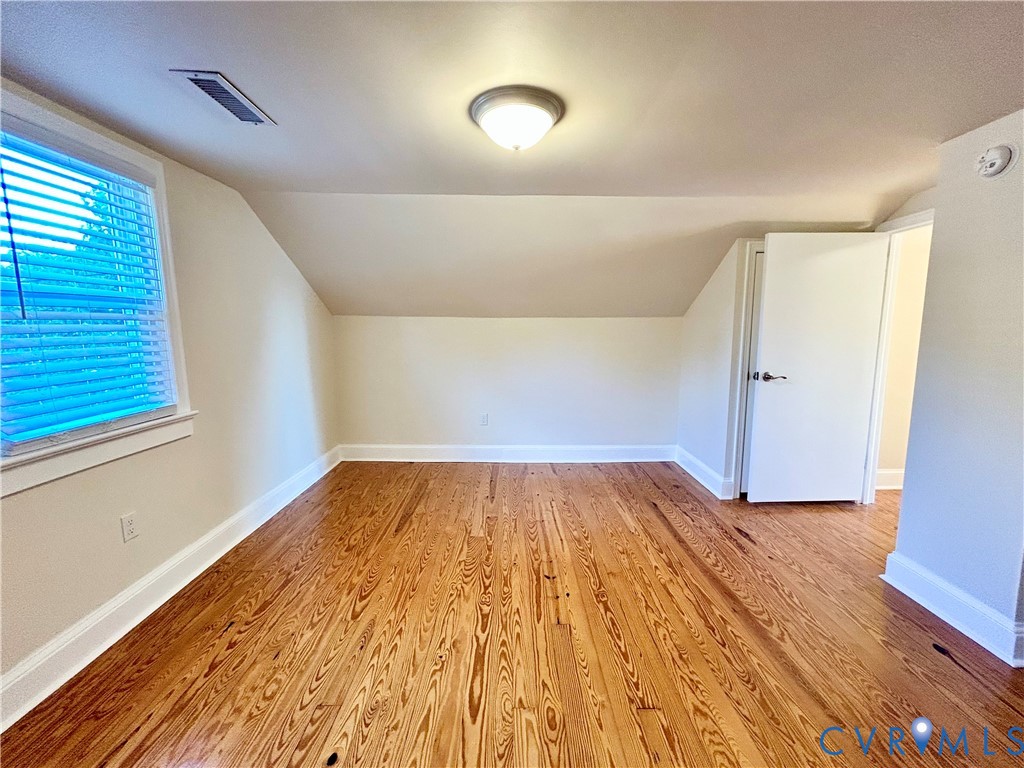 411 Hillcrest Avenue Colonial Heights, VA 23834 - Photo 20 of 33 a view of empty room with wooden floor