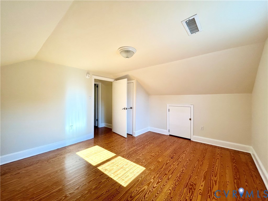 411 Hillcrest Avenue Colonial Heights, VA 23834 - Photo 26 of 33 a view of empty room with wooden floor