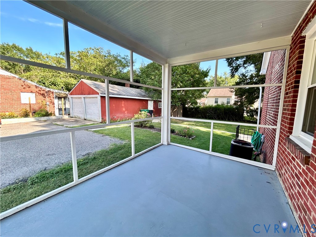 411 Hillcrest Avenue Colonial Heights, VA 23834 - Photo 10 of 33 a view of a house with a yard from a porch