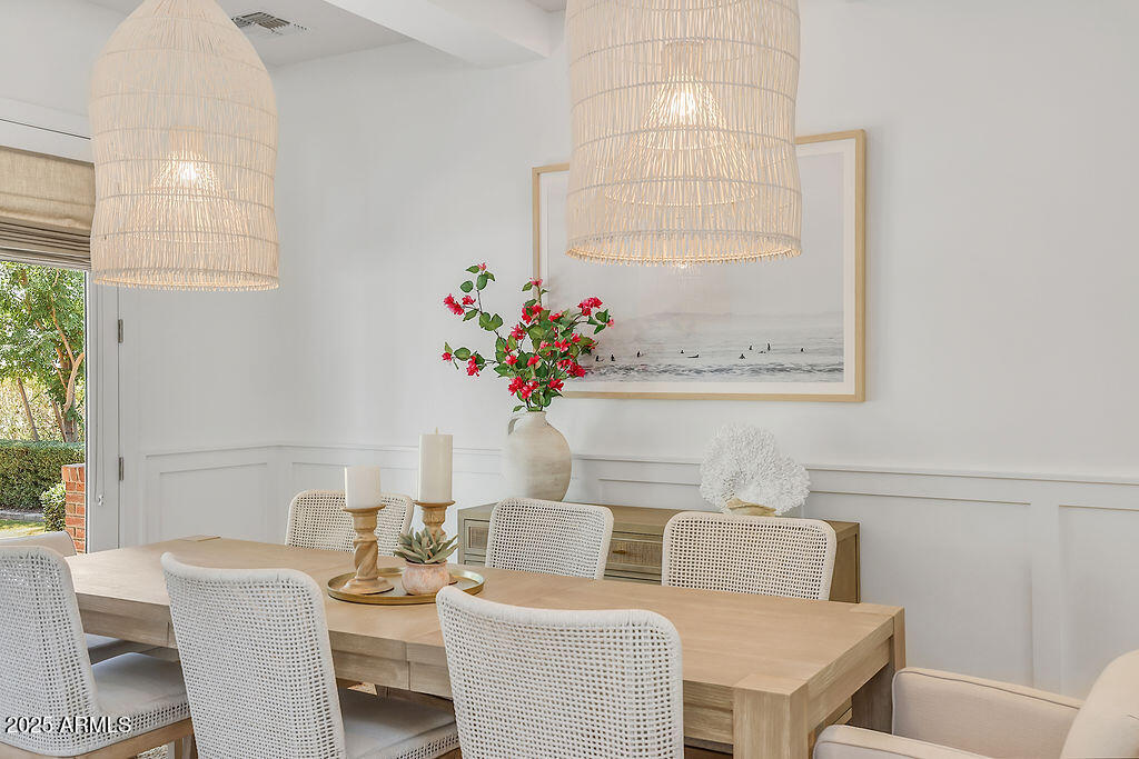 3924 East Roma Avenue Phoenix, AZ 85018 - Photo 14 of 32 a living room with furniture and a table