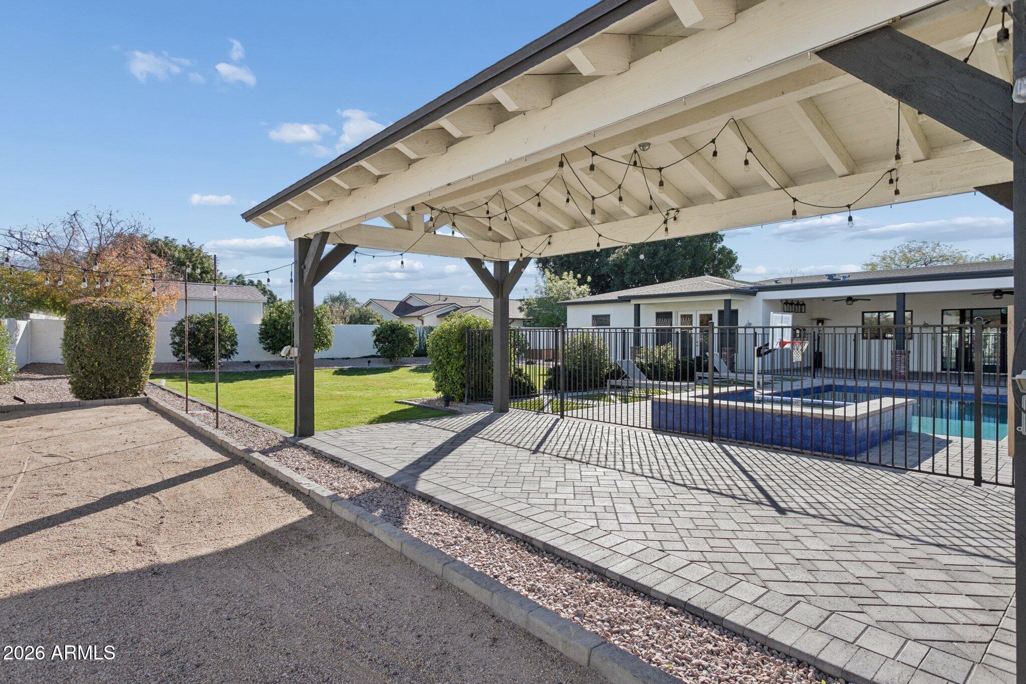 3924 East Roma Avenue Phoenix, AZ 85018 - Photo 27 of 32 a view of a house with a swimming pool