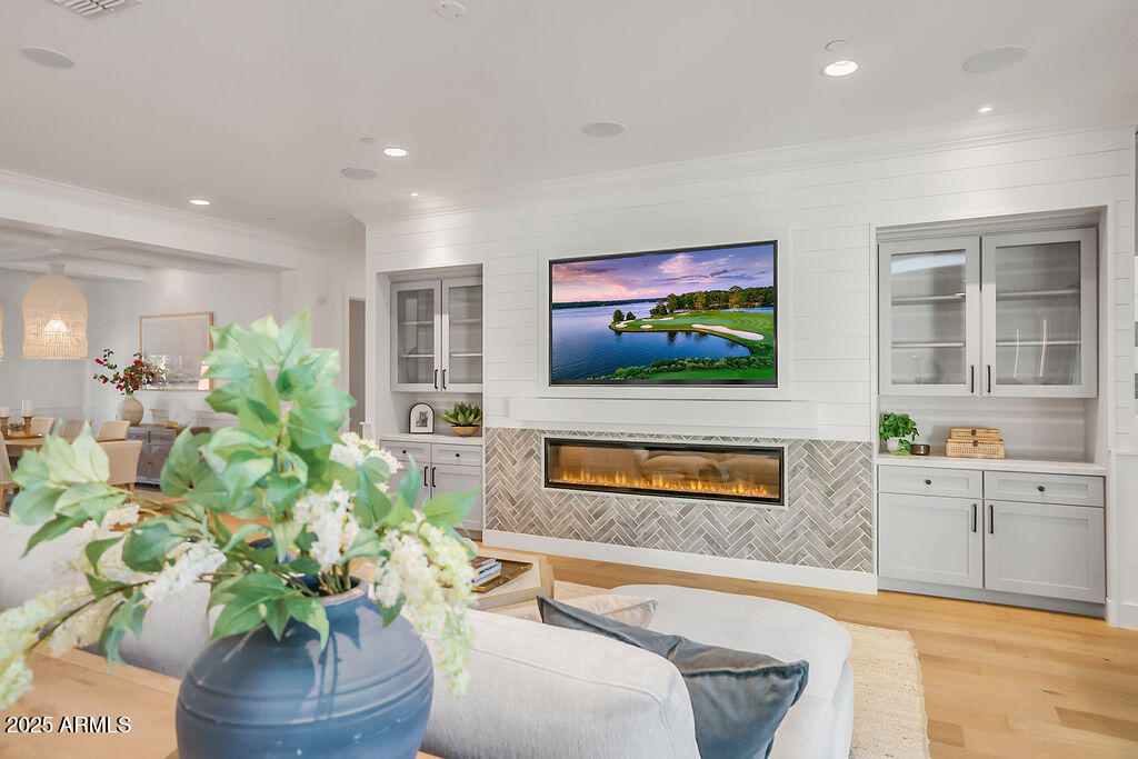 3924 East Roma Avenue Phoenix, AZ 85018 - Photo 7 of 32 a living room with furniture and a flat screen tv