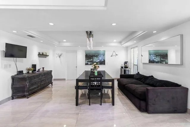 a living room with furniture and a couch