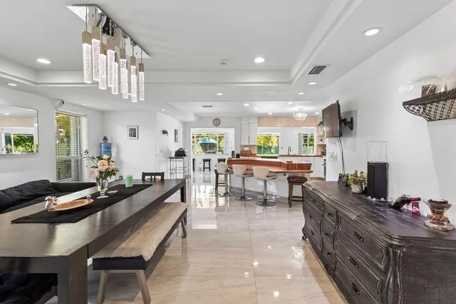 a room with a wooden floor and utility room