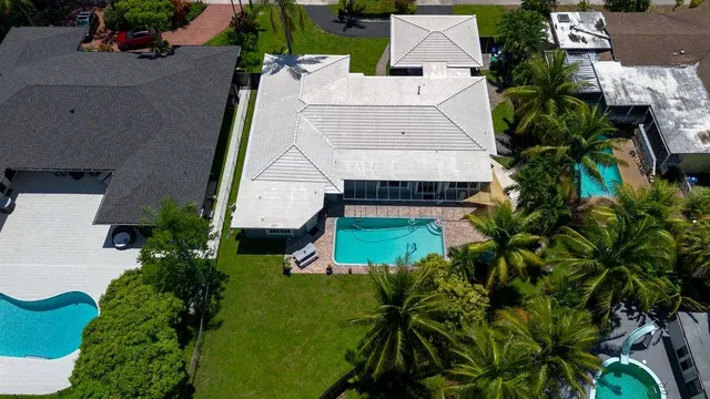 a view of a swimming pool with a lounge chairs
