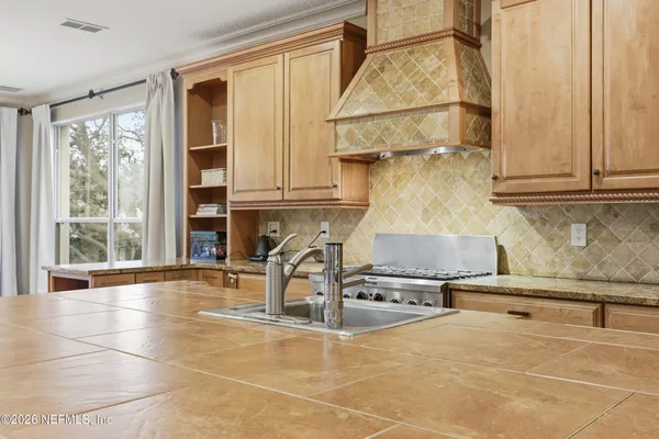 a view of swimming pool from a balcony