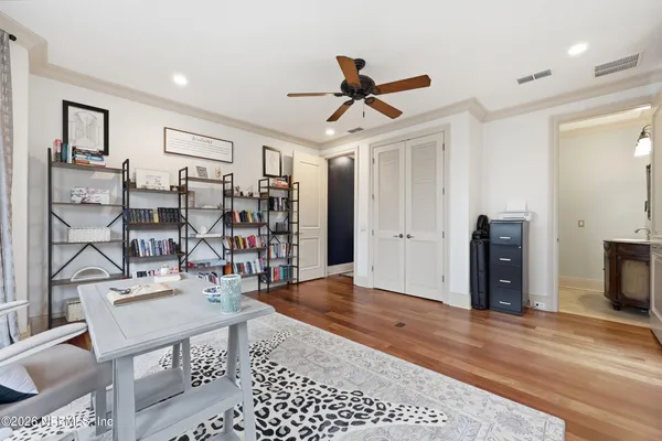 a sign that is on the side of a lake