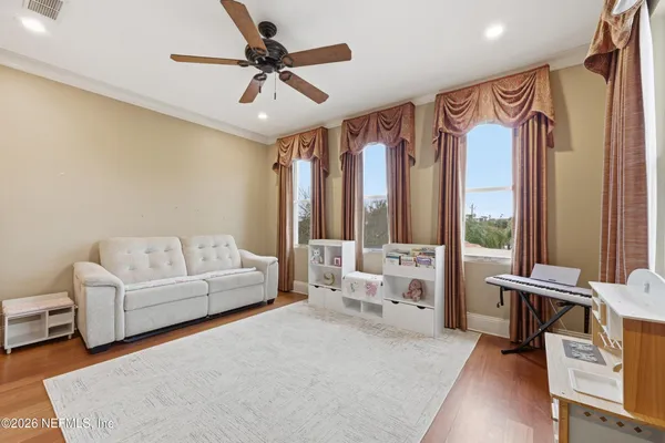 an aerial view of a house with a lake view