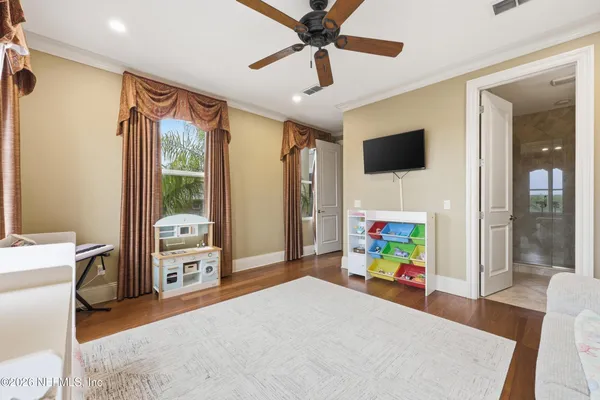 an aerial view of a house with outdoor space