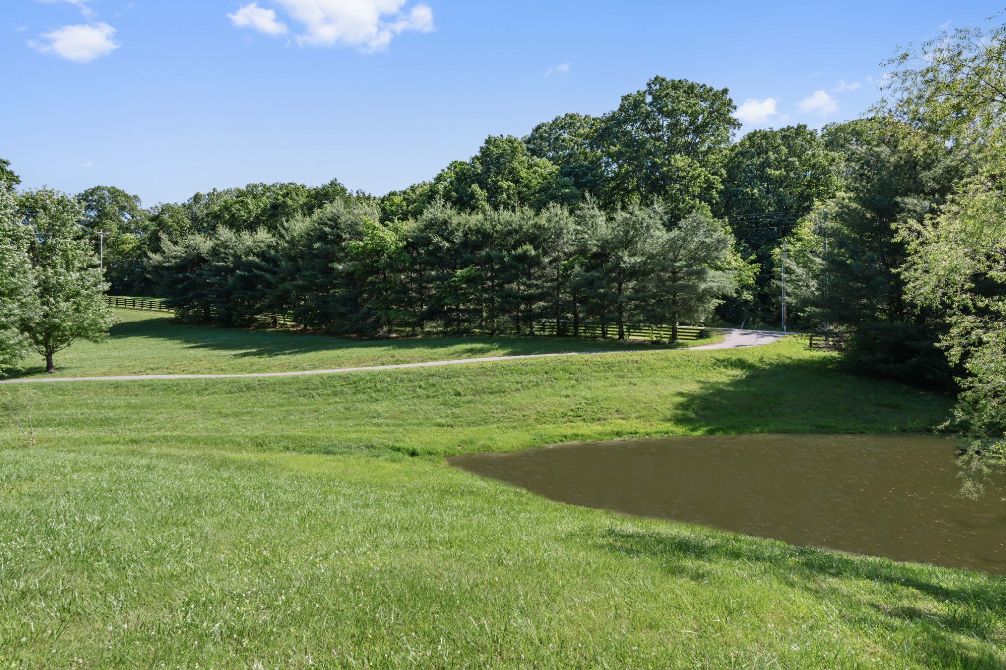 3551 Bailey Road Franklin, TN 37064 - Photo 43 of 52 a view of a golf course with a lake