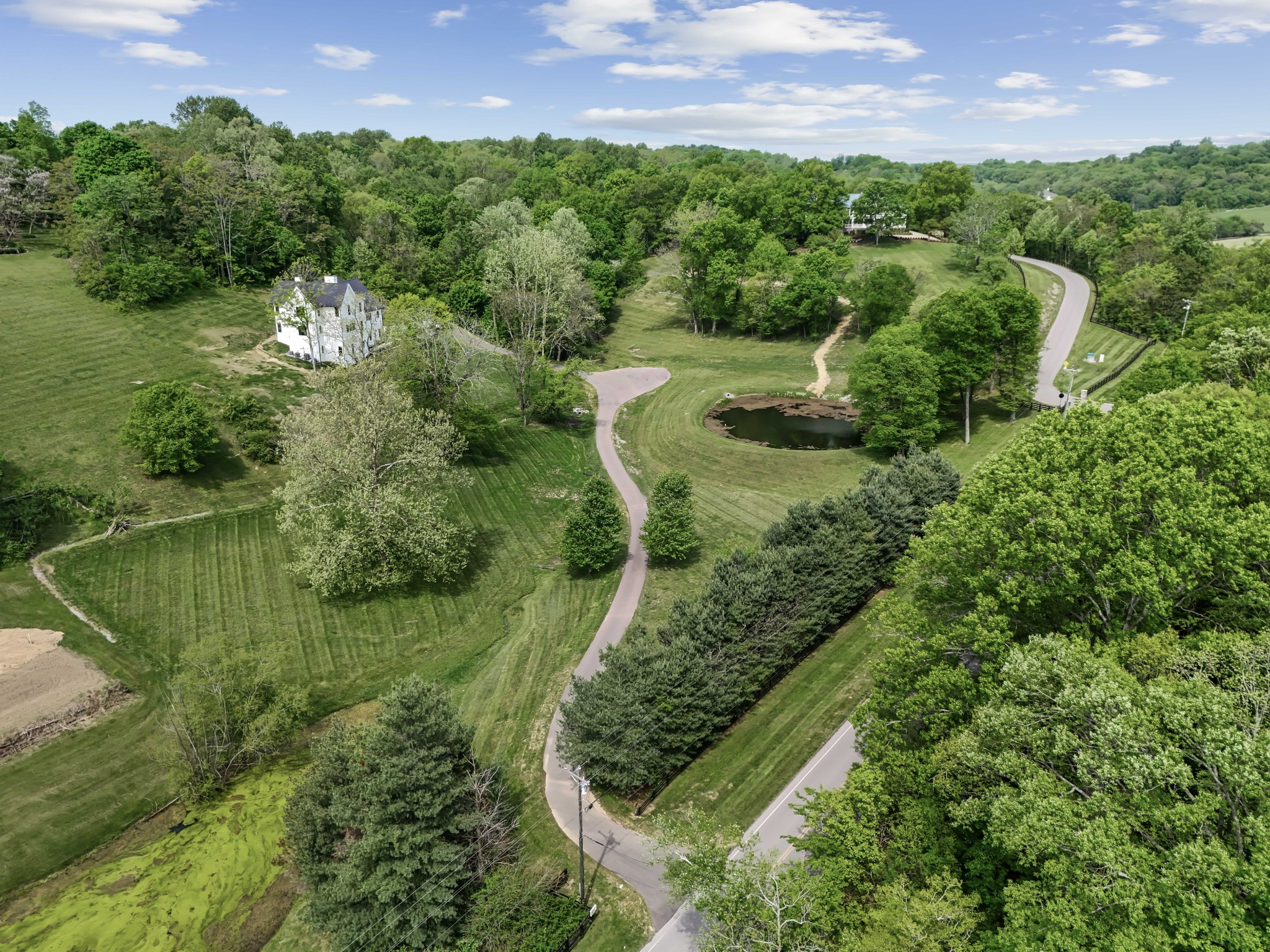 3551 Bailey Road Franklin, TN 37064 - Photo 48 of 52 a view of a garden with a building in the background
