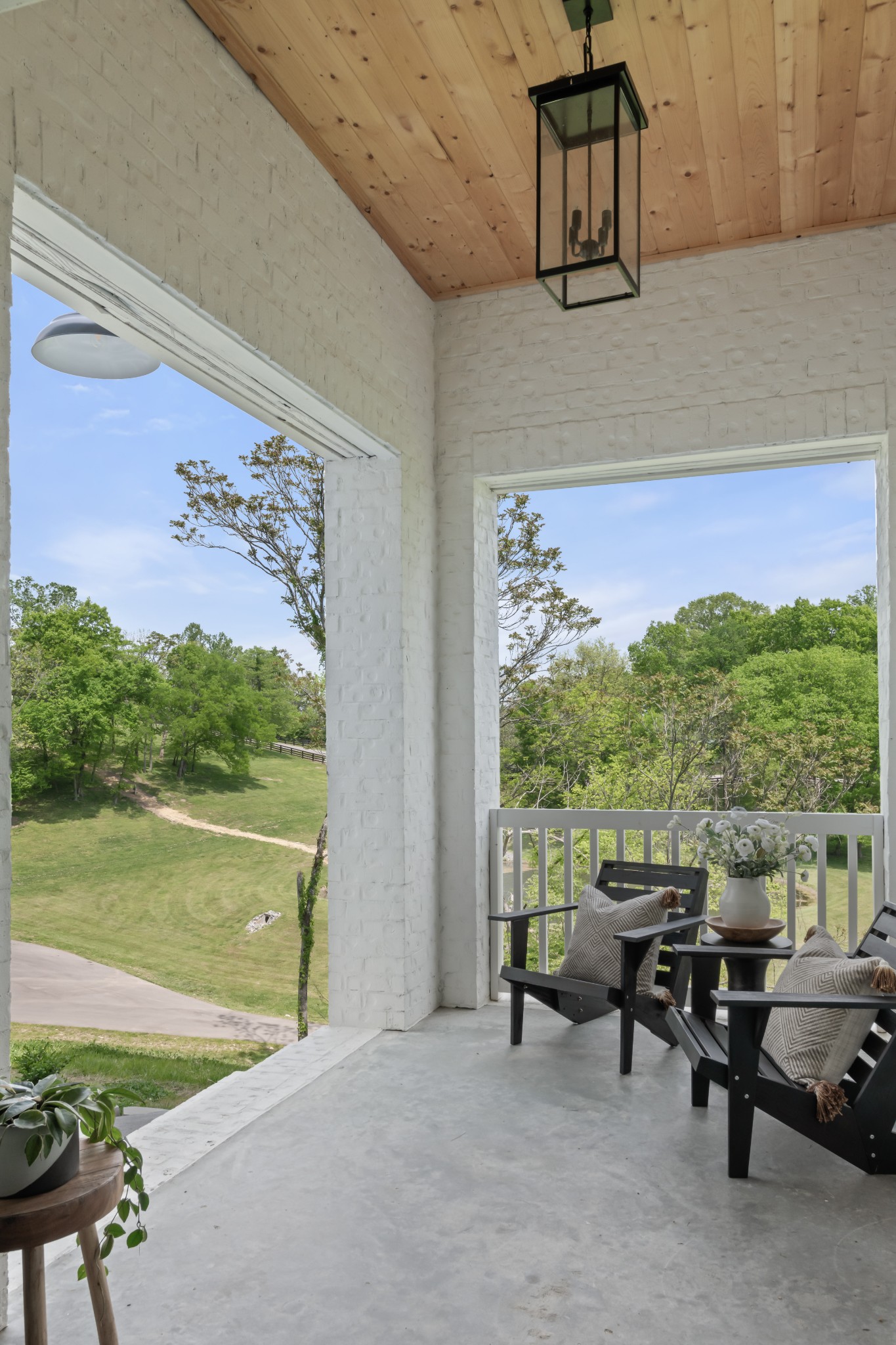 3551 Bailey Road Franklin, TN 37064 - Photo 10 of 52 a view of a patio with lawn chairs floor to ceiling window and an outdoor space