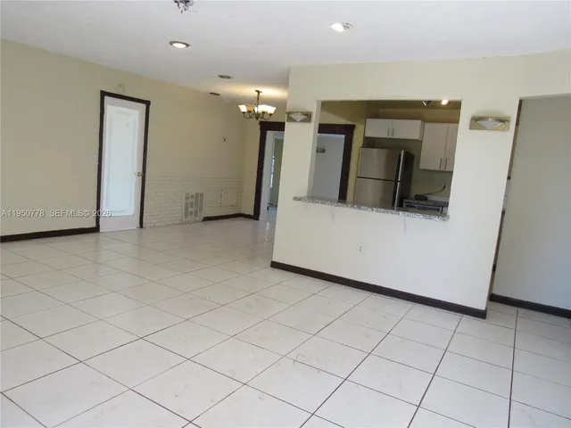 a view of a kitchen with a sink