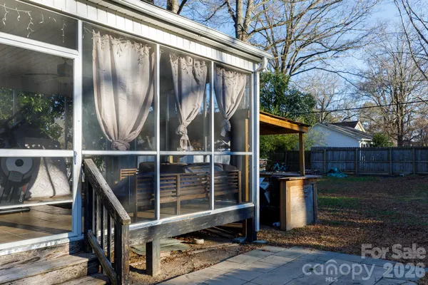 a view of backyard with cabin