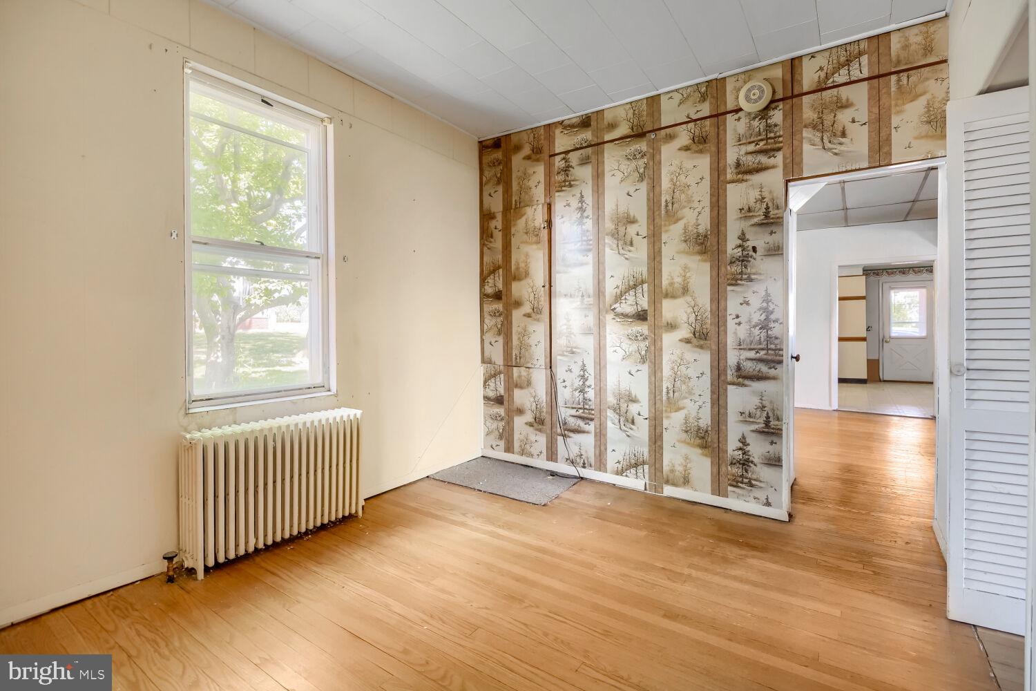 8413 Philadelphia Road Baltimore, MD 21237 - Photo 11 of 27 Charming space with vintage wallpaper.