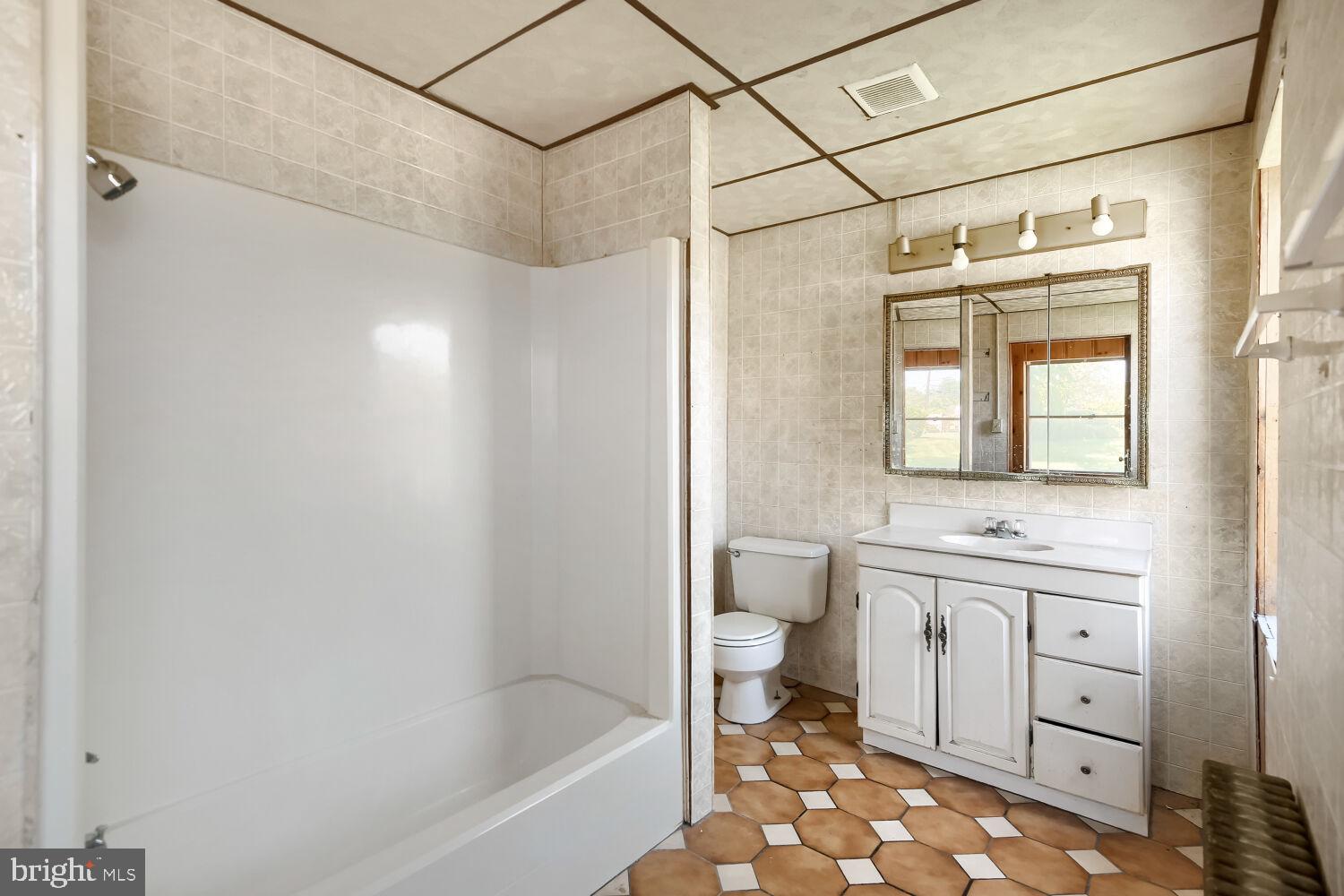 8413 Philadelphia Road Baltimore, MD 21237 - Photo 15 of 27 Bright and spacious bathroom retreat.