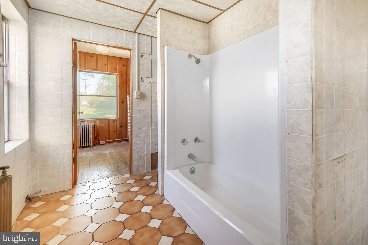 8413 Philadelphia Road Baltimore, MD 21237 - Photo 16 of 27 Bright and spacious bathroom retreat.