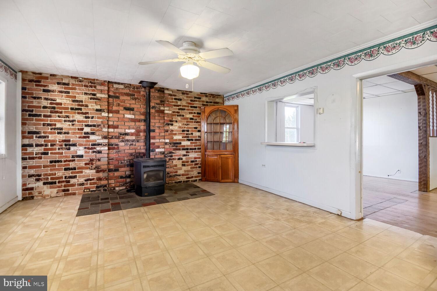 8413 Philadelphia Road Baltimore, MD 21237 - Photo 6 of 27 Cozy space with rustic charm.