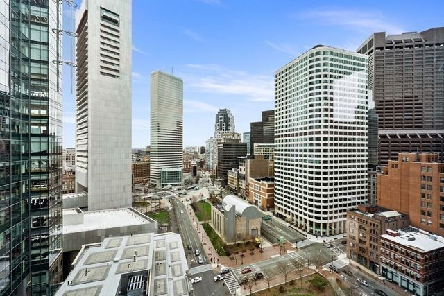 a view of city with tall buildings