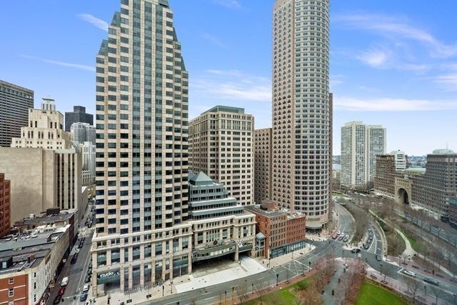 a view of a city with tall buildings