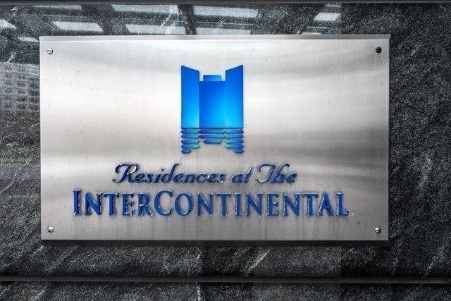 a view of a building with a street